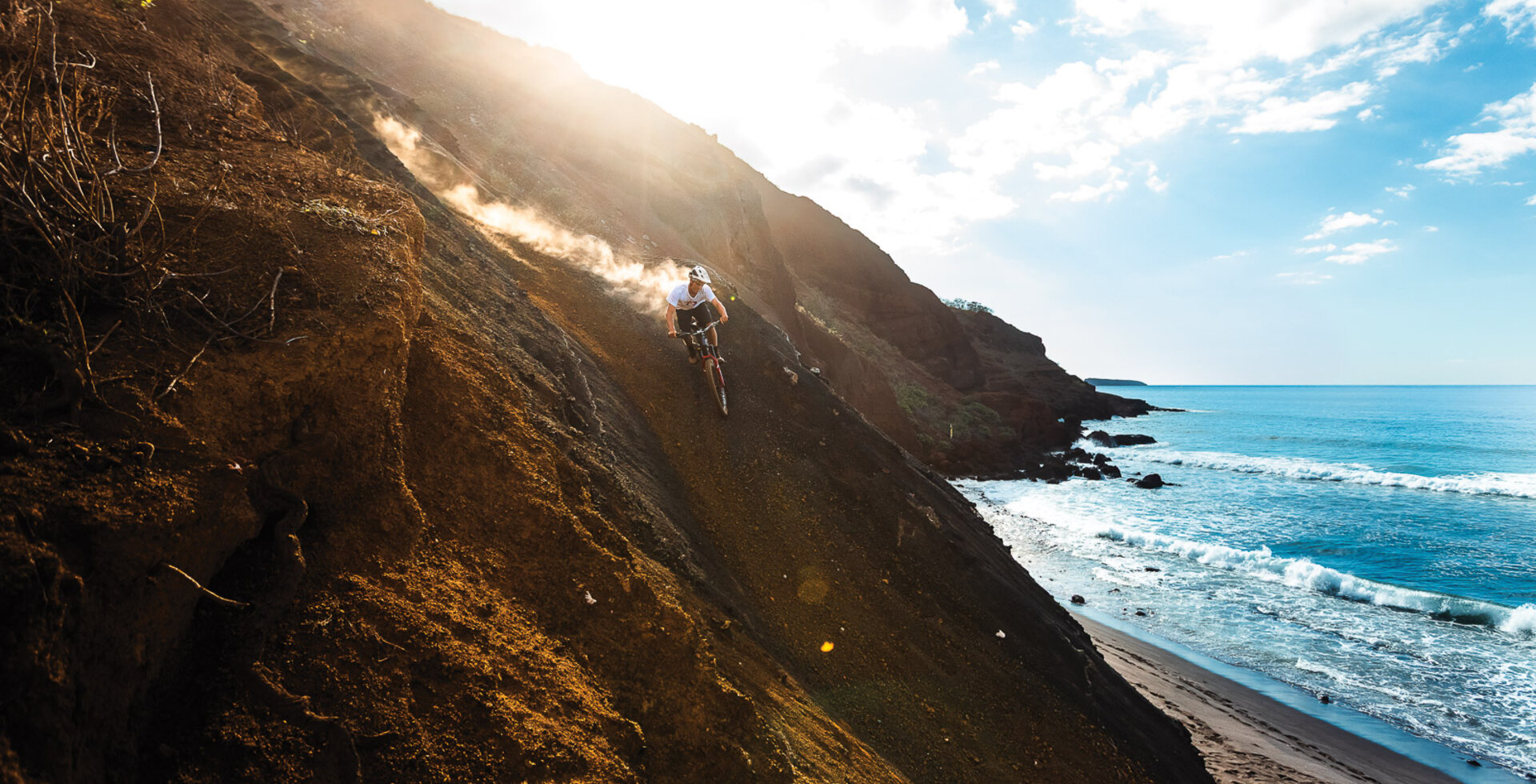 Eddie Reynolds finds a beachside freeride line on Maui. With the addition of a bike park, Maui’s mountain bike scene is emerging from the shadows and into the mainstream. Photo: Joonas Vinnari