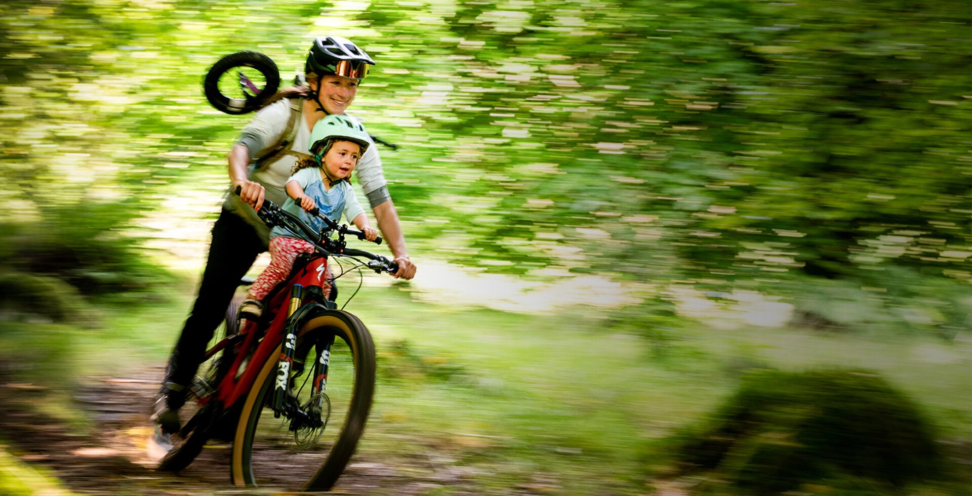 Three days before the due date of her second baby, Hannah Barnes and her daughter Inga ride one of their favorite trails.