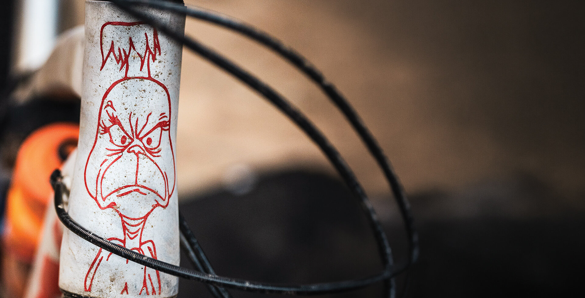 A custom Grinch headtube sticker, made by former Kona Bicycle industrial designer Gavin Stewart, dons one of the brand’s 2018 prototype models of aluminum Process 153 bikes. Kona, long known for its playful designs and rock-solid products, sold to a private equity sports conglomerate in 2022 before being reacquired by its original owners in 2024. Photo: Paul Kelly