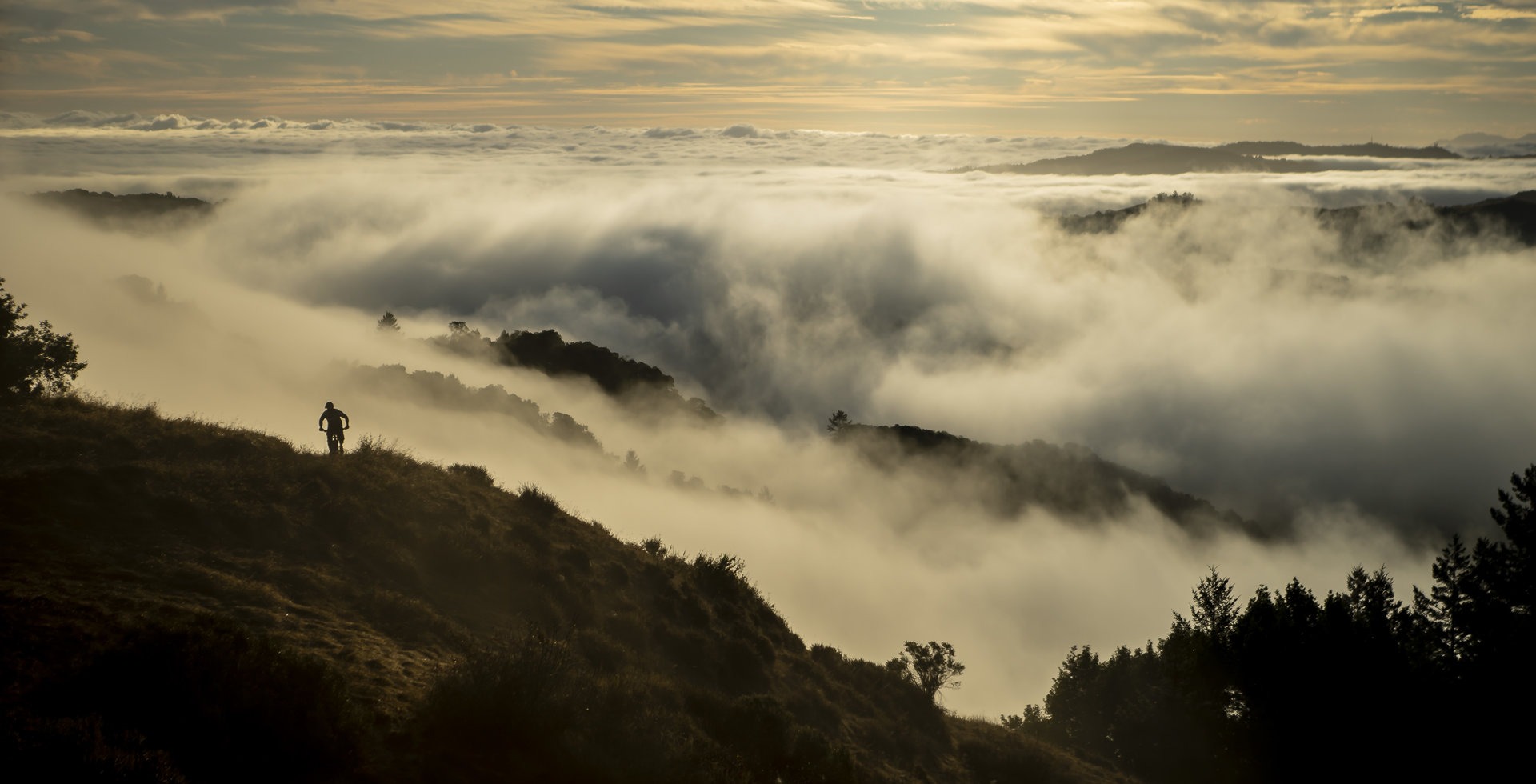 Early mornings at Tamarancho provide stunning views and often empty trails. Vernon Huffman starts the day off right as the clouds roll through the valley. Photo: Jann Eberharter