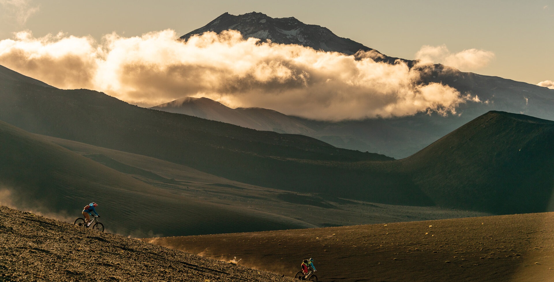 Chilean mountain bike guide Ernesto “Máquina” Araneda leads writer Andrew Findlay down a slope of volcanic debris in the shadow of the towering Volcán Lonquimay, which last erupted violently on Christmas Day in 1988.