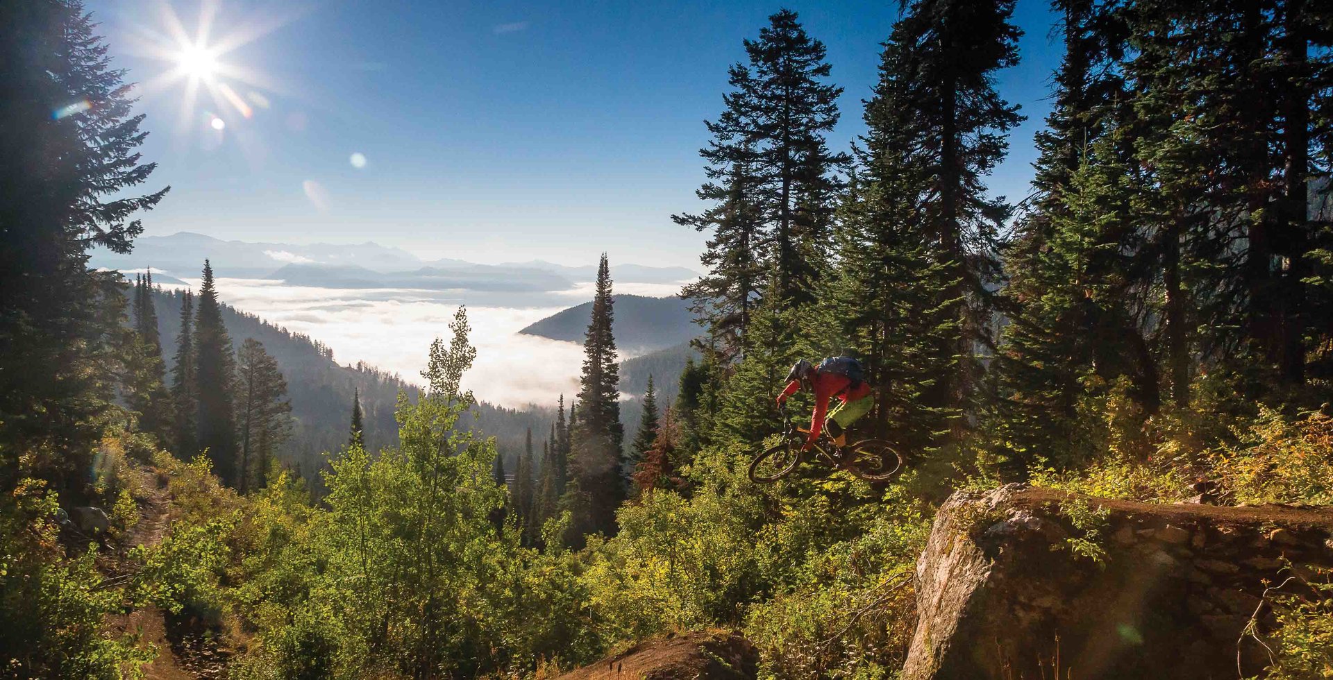 Teton Pass’ Fuzzy Bunny Trail might sound cute and fluffy, but there are plenty of moves that can eat even experienced riders. Andrew Whiteford risks life and limb while sending one of the trail’s many gaps, just as the fog rolls into the valley below.