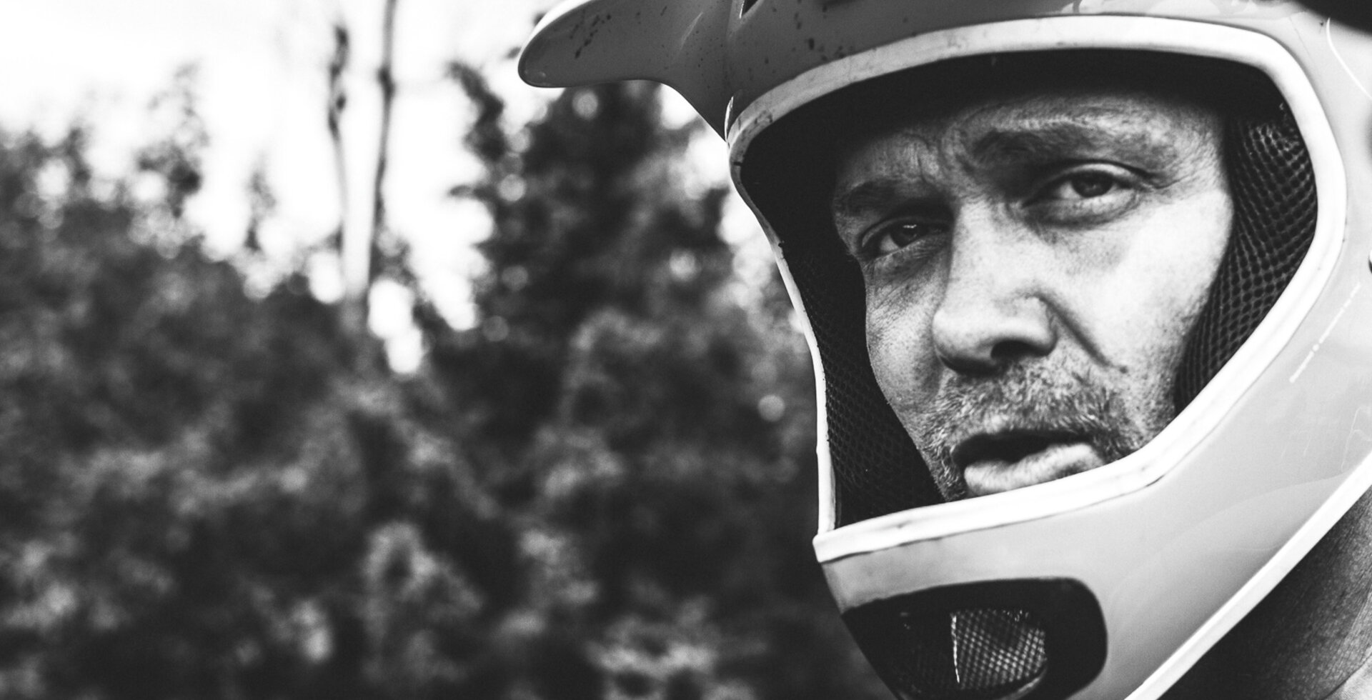 Hansi Johnson, dressed in his other “business suit.” As former Midwest regional director for the IMBA and now the director of regional lands for the Minnesota Land Trust, Hansi’s work attire can consist of a full-face as often as a necktie.