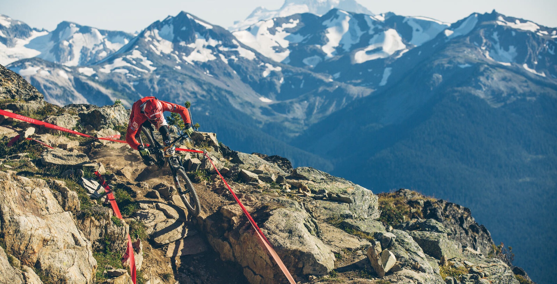 Duncan Riffle drops into Top of the World to start the fifth and final stage of the 2015 Crankworx Whistler Enduro race. This stage, which started above tree line at the top of Whistler Mountain and finished at the base of the Whistler Mountain Bike Park, is one of the longest and most technically demanding in the short history of enduro racing.