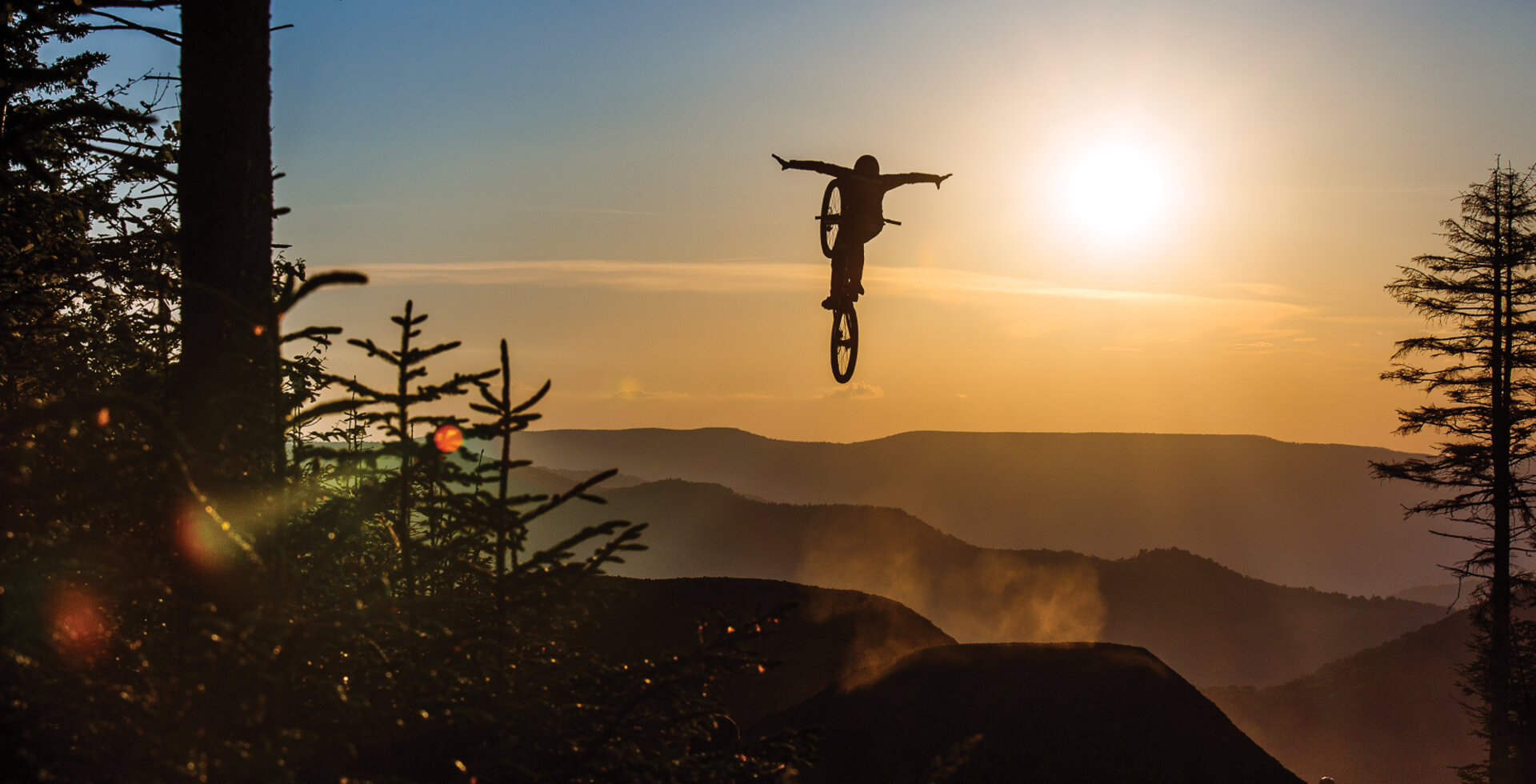 American downhill racer Dakotah Norton has some fun during practice at the top of Western Territory before the 2019 UCI World Cup at Snowshoe Mountain. Norton went on to finish 9th at finals later that weekend, which was the debut of World Cup races held at the resort. Photo by Kurt Schachner | CANON 1/320, F/11, ISO 1000