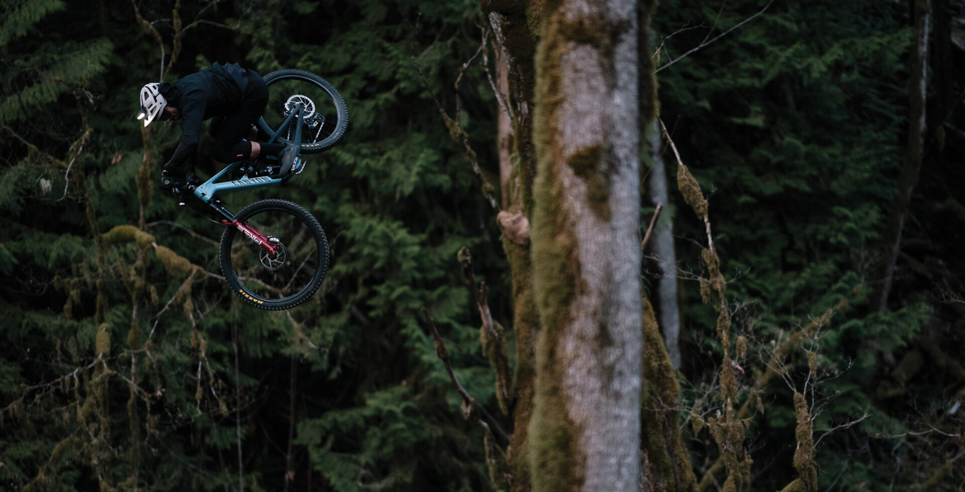 As the sun drops behind the mountains in Squamish, BC, Bringhurst puts in a few final reps on the local dirt jumps with headlights on his bike. Photo: Anthony Smith