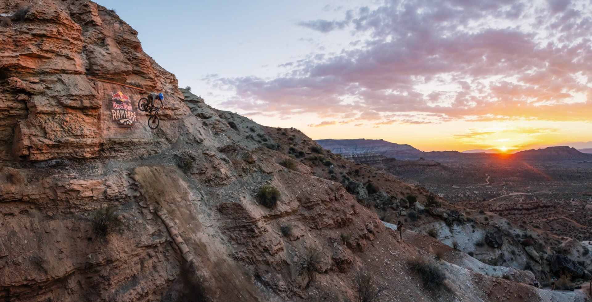 Casey Brown drops into what she later called the biggest feature she'd ever ridden during training before the first-ever women's Rampage event. Photo: Katie Lozancich