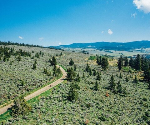 With five flats in the span of fewer miles, this shortcut was anything but. When the crew finally made it back onto the highway, the detour had cost them an additional two hours. But after bombing the loose descent into Clinton the way only mountain bikers would, drifting through corners, nobody seemed to care. Photo: Graeme Meiklejohn