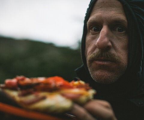 Brice Minnigh enjoying some fine dining in the mountains of Argentine Patagonia, on location with Anthill Films for a segment of the upcoming <i>Return to Earth</i> movie. Photo: Margus Riga