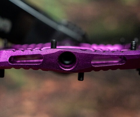 The OneUp Wave flat pedal has a unique new profile.