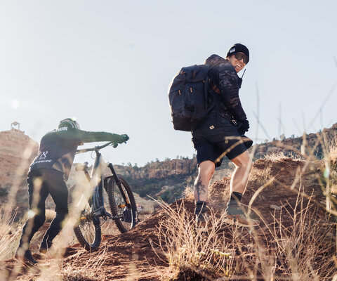 Photographer Paris Gore makes his way up the course at Red Bull Rampage.