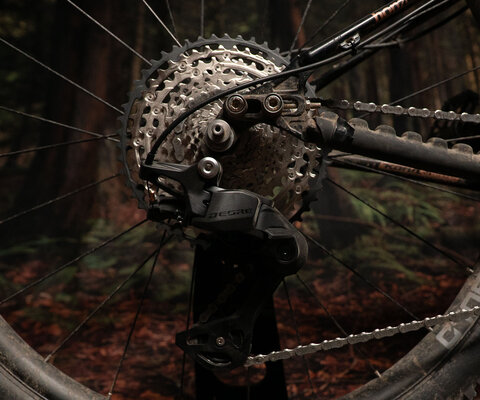 It looks a whole lot like Deore Di2, but with a cable.
