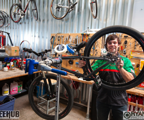 Cully Radvillas getting bike ready as he talks with us about his work at SRAM.